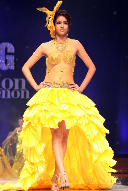 A Myanmar model presents dresses created by a local designer during 1st Myanmar Fashion Designer Group's Fashion Phenomenon at Myanmar Convention Center (MCC) Saturday, Oct. 1, 2011, in Yangon, Myanmar A Myanmar model presents dresses created by a local designer during 1st Myanmar Fashion Designer Group's Fashion Phenomenon at Myanmar Convention Center (MCC) Saturday, Oct. 1, 2011, in Yangon, Myanmar