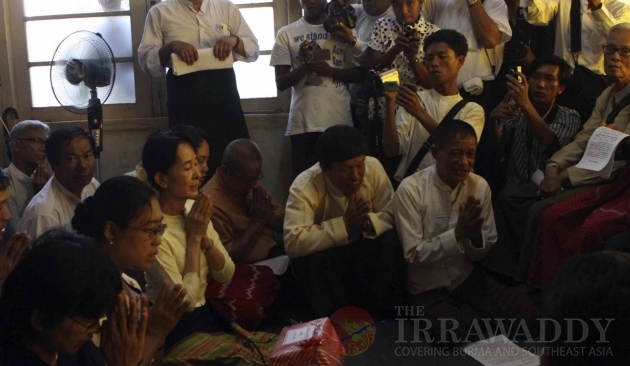 Burma pro-democracy leader Aung San Suu kyi and her party's members  pay respects to doyen politicians in Rangoon, Burma.