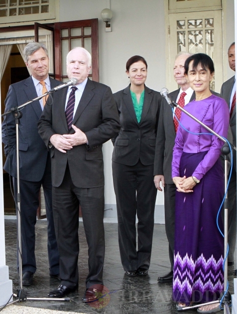 Suu Kyi meets U.S senator McCain at her house on Sunday, Jan.22, 2012, in Yangon, Myanmar