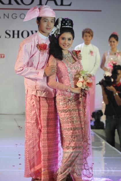 Myanmar models present weddingdress during a wedding birdal show at Park Royal hotel on Sunday, Aug.19, 2012, in Yangon, Myanmar.