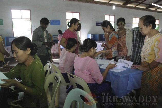 Voters register at the volunteers at the poll station.