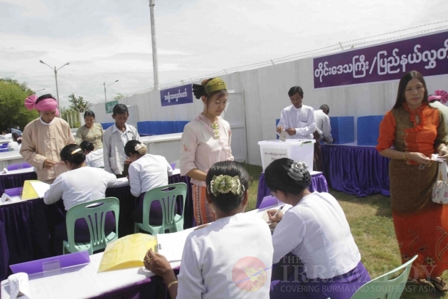 Shan people register before casting their vote at the polling station in Nay Pyi Daw.