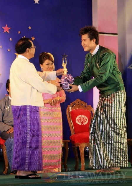 Winner of Myanmar's Academy Award for 2009 pose with their awards at the annual Academy Awards organized by Myanmar Motion Picture Enterprise at the open-air theater of city hall in Nay Pyi Daw, Burma.