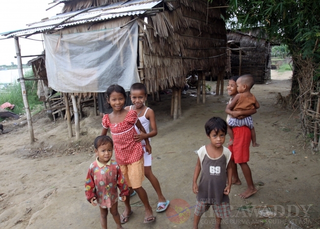 Children near their make shift tent in Nyaung Tone, Burma Irrawaddy Delta, about 60 miles southwest of Rangoon, Burma.
