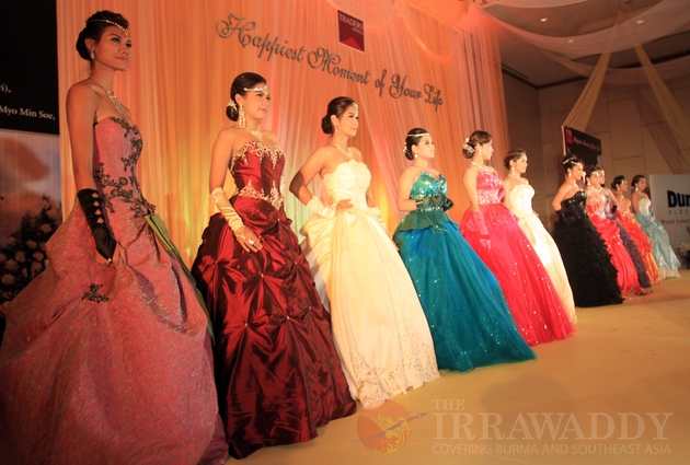 Burma models perform wedding dresses created by Burma designers during the title of “Happiest Moment of Your Life” at Traders Hotel in Rangoon, Burma. Burma models perform wedding dresses created by Burma designers during the title of “Happiest Moment of Your Life” at Traders Hotel in Rangoon, Burma.