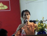 Burma pro-democracy leader Aung San Suu Kyi delivers her speech on the National Day at NLD headquarters in Yangon, Burma.