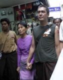 Daw Aung san Suu Kyi and her son Kim Aris visited at the Bogkyoke market in Rangoon, Burma.