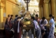 Buddhist devotees pour water to Buddha image as they pay homage to world famous Shwedagon Pagoda in Rangoon, Burma.