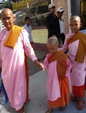 Nuns are walking on the street in Rangoon, Burma.