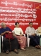 Burma pro-democracy leader Aung San Suu Kyi and party's senior leaders attend a ceremony of donation cash to family members of political prisoners at NLD party's headquarters in Rangoon, Burma.
