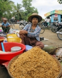 Vendors sell dry fishes at market in Nyaung Tone, Burma Irrawaddy Delta, about 60 miles southwest of Rangoon, Burma.