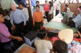 U.S. Senator John McCanin visits the shelter for AIDS patients run Phyu Phyu Thin, Burma's well-known AIDS activist in Rangoon, Burma.