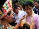 Myanmar democracy leader Aung San Suu Kyi arrives at Nyaung Oo Airport this morning  and she will stay at Bagan Hotel in Myanmar’s ancient historic city Bagan Myanmar on Monday, July.4, 2011. While she arrives at Bagan Hotel, she receives a flower from a hotel receptionist.