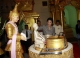 Thailand's Prime Minister Yingluck Shinawatra pours water on a buddha during her visit to the Shwedagon pagoda on Tuesday, Dec. 20, 2011, in Yangon, Myanmar. Myanmar opposition leader Aung San Suu Kyi met Thailand's prime minister on Tuesday in her first ever audience with a head of government from the region, her political party said. The meeting was also Suu Kyi's first with a prime minister since her release from house arrest about a year ago