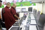 Monks at the IT Fair, 28 Feb 2012, Yangon, Myanmar.