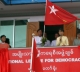 Myanmar opposition leader Aung San Suu Kyi, center, attends an opening ceremony of a branch office of her National League for Democracy party on Wednesday, 15 August 2012, Naypyidaw, Myanmar.