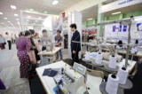 14-12-12 - Textile & garment exhibit - PHJOTO - Khin Maung Win Myanmar International Textile & Garment Industry Exhibition are held at Tatmadaw Exhibition hall Friday, December.14, 2012, in Yangon, Myanmar. The Exhibition will be held from 14 Dec to 17 Dec.