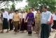 Daw Aung San Suu Kyi visits Kaw Hmu Thursday, May.16, 2013, in Yangon, Myanmar.