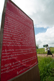 The poster saying that the resident are strongly agree to the "Yangon New Town Plan" put at the head of Tamar Kaw Village entry road in Toon Tay Township which lies on the other side of Yangon City and where 'Yangon New Town Plan' is schemed to be implementing within September. However, the villagers said the poster was placed by the administrators. (Photo – Sai Zaw/ Irrawaddy)