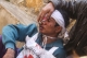 Two Red Cross members were injured during an attack by Kokang rebels according to the Myanmar army,on Red Cross convoy carrying war refugees from Laukkai on Feb. 17, 2015, where insurgents are in conflict with the Burma Army. (Photo: JPaing / The Irrawaddy)