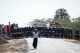 Police erecting barriers at Nawin Valley at the entance to Taungtha. ( Photo - JPaing / The Irrawaddy)
