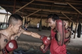 Moe Hein practices for his next fight with coach Shwe Kyi San in Me-Kathi Club, February 2015. (Photo: Timo Jaworr / The Irrawaddy)