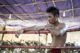 Htet Lin from Me-Kathi Club rests after an exhausting fight, February 2015. (Photo: Timo Jaworr / The Irrawaddy)