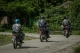Myanmar border police on motorcycles approaching the Border Guard Police headquarters in the Kyinkanpyin area of Maungdaw township, in Rakhine State on Oct 17, 2016.