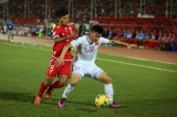 Myanmar player in action against Vietnam player during the AFF Suzuki Cup Group B soccer match in Thuwanna Football statdium in Yangon, Myanmar, November 20, 2016. Hein Htet/The Irrawaddy