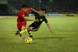 Malaysia player in action against Myanmar player during the AFF Suzuki Cup Group B soccer match in Thuwanna Football statdium in Yangon, Myanmar, November 26, 2016. Hein Htet/The Irrawaddy