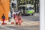 People cross the road near downtown Yangon under the scorching sun of spring on February 11, 2019.  Photo - Htet Wai/ Irrawaddy