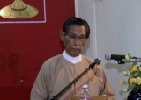 The Deputy Leader of the National League for Democracy U Tin Oo gives a speech on the National Day at NLD headquarters in Rangoon, Burma