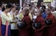 Novices receive donation of alms from NLD leader Aung San Suu Kyi in Rangoon, Burma.
