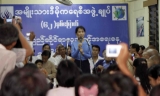 Burma pro-democracy leader Aung San Suu Kyi delivers her speech on the international human rights day at National League for Democracy (NLD) headquarters in Rangoon, Burma.