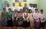 Democratic Party (Myanmar) memberships took a group picture at their office.