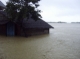 Half of the house is under the water in Arakan State, Western Burma.