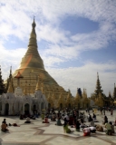 Buddhist devotees pray at Victory Ground of Shwedagon Pagoda in Rangoon, Burma.