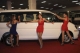 Burma models pose as they advertise autos assembled at home during Myanmar Auto and Auto Parts Expo in Rangoon, Burma.