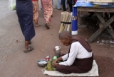 19-02-11 A woman begs on the street in Burma