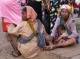 Women with children begging in Burma