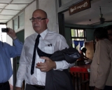 Ross Dunkley, editor of the Myanmar time’s journal, appearing to hear his case at the Kamayut township court in Rangoon, Burma.  He was scheduled to hear again on 11 April 2011.