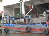 Burmese workers are working at the port in Ranong, Thailand.