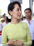 Burma Pro-democracy leader Aung San Suu Kyi attends a ceremony of the 10th founding anniversary of a private charity group, the Free Funeral Service Society in Rangoon, Burma.
