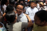 Family members welcome prisoner outside the Burma's Insein Prison after they are released as the new government cut one year from their prison terms under a &quot;general amnesty&quot; programmed in Rangoon, Burma.