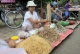Vendors sell dry fishes at market in Nyaung Tone, Burma Irrawaddy Delta, about 60 miles southwest of Rangoon, Burma.
