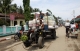 22-05-11 - Photo:- The Irrawaddy Villagers carry goods on their tractor as they return from market in Nyaung Tone, Burma Irrawaddy Delta, about 60 miles southwest of Rangoon, Burma.