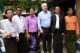 U.S. Senator John McCanin (3rd from Right) poses photo with Phyu Phyu Thin (3rd from Left), the well-known AIDS activist, during his visit to the activist's shelter for AIDS patients in Rangoon, Burma.