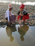 Kachin girls fetches water from Myitson River in Myikyina in Kachin state, Northern Burma.