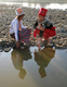Kachin girls fetches water from Myitson River in Myikyina in Kachin state, Northern Burma.