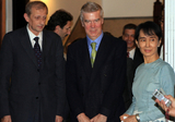 Burma pro-democracy leader Aung San Suu Kyi (Right) Mr. Robert Cooper(Center), Director-General, General Secretariat of the Council of the European Union, External Economic Relations, Politico-Military Affair Mr. Piero Fassino, EU special envoy for Burma (Left) pose for photos, after meeting at her home in Rangoon, Burma.